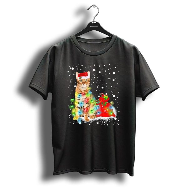 Bengal Cat With Christmas Hat And Colorful Lights In Snowy Holiday Scene T Shirt 1 t shirt 1