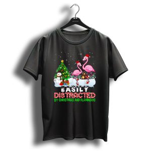 Easily Distracted By Christmas And Flamingos With Santa Hats In Snow Scene With Tree And Snowman T Shirt