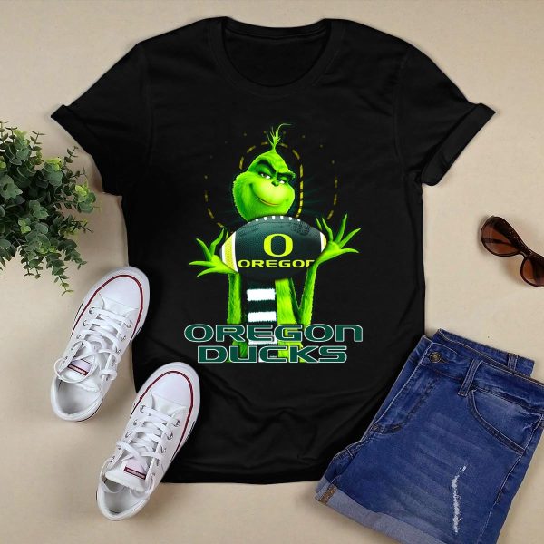 Grinch Holding Oregon Ducks Football T Shirt 1