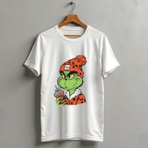 Grinch Wears Orange Beanie Holds Browns Mug Christmas T-Shirt