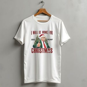 I WI'll Be Home For Christmas 2025 Trump Santa Hat Thumbs Up T-Shirt