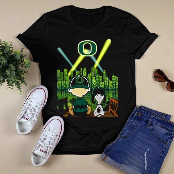 Oregon Ducks Nighttime Cityscape With Cartoon Characters And Stadium Lights T Shirt 1