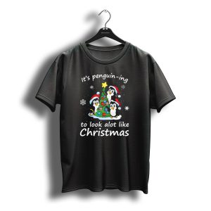 Penguin Ing To Look Alot Like Christmas Penguins Tree Santa Hats Snowflakes T-Shirt