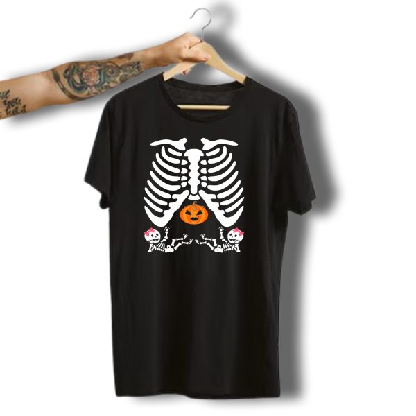 Pregnant Halloween Skeleton Rib Cage With Pumpkin And Twin Girl Skeletons T Shirt t shirt 1