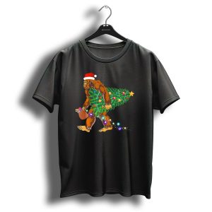 Santa Hat Bigfoot Holding Christmas Tree With Lights And Gifts T Shirt
