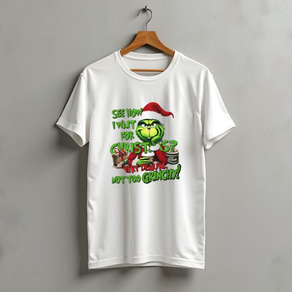 See How I Wait For Christmas Very Demure Not Too Grinchy With Santa Hat And Gifts T Shirt t shirt 1