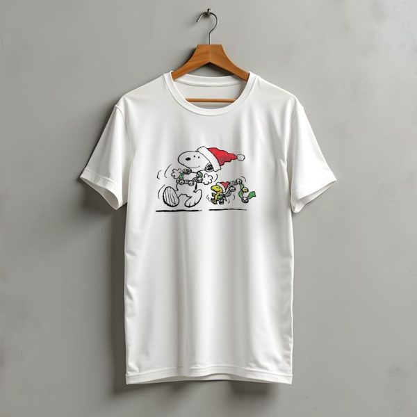 Snoopy And Woodstock Dancing In Santa Hats Christmas T Shirt t shirt 1