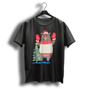 The Big Christmas Bear In Sweater With Santa Hat And Mittens Near Festive Decorated Tree T Shirt